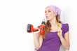 © godfer - woman with drill doing home improvement
