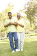 © Monkey Business - Senior Couple Walking In Park