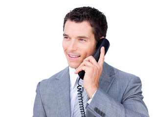 Wall Mural - Smiling businessman talking on phone