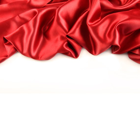 Red satin fabric against white