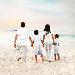 Family Holding Hands at the Beach Picturesque Portrait