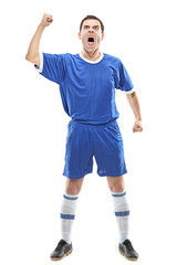 soccer player standing and screaming