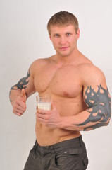 Bodybuilder with milk
