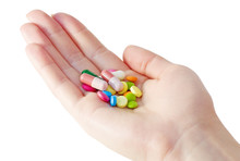 medicines and pills on the palm