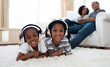 © WavebreakMediaMicro - Cute siblings listening music