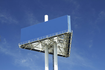 A blank blue billboard on a unipole