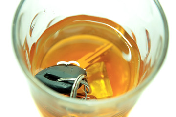 car keys in whiskey tumbler