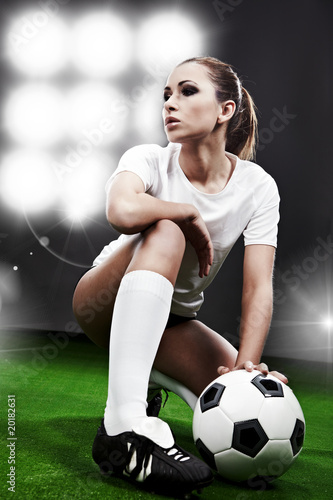 Fototapeta do kuchni Sexy football player, woman on playing stadium