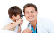 © WavebreakMediaMicro - Little boy checking doctor's ears