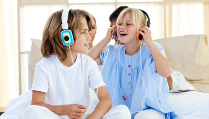 Canvas Print - Joyful children having fun and listening music