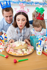 Wall Mural - Brunette mother celebrating her birthday