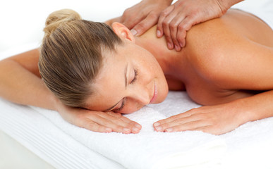 Smiling woman having a massage