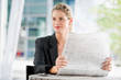© EastWest Imaging - Woman with Newspapers