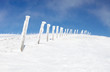 Snow-covered columns at top of mountain