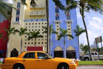 Wall Mural - Yellow cab with Miami Beach Florida buildings