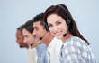 © WavebreakMediaMicro - Attractive business woman and her team working in a call center