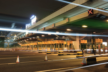 Canvas Print - toll booths with car light in Hong Kong