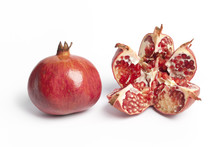 One Whole Pomegranate And An Open One