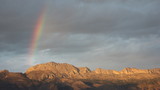 Fototapeta Tęcza - arco iris sobre la montaña