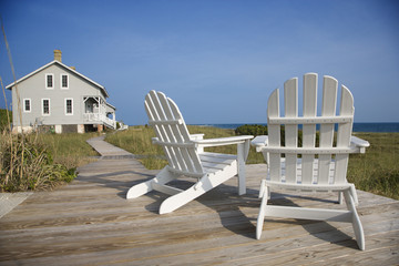 Wall Mural - Chairs on Deck Facing Ocean