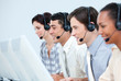 © WavebreakMediaMicro - International customer service representatives with headset on