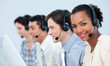 © WavebreakMediaMicro - Multi-ethnic business people using headset