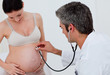 © WavebreakMediaMicro - Brunette pregnant woman examined by her gynecologist