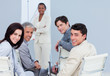 © WavebreakMediaMicro - Smiling international business people at a presentation