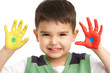 © Monkey Business - Studio Portrait Of Young Boy With Painted Hands