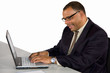 © foto ARts - smiling African-American businessman working with laptop