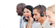© WavebreakMediaMicro - Close-up of joyful business people working in a call center