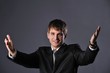 © Nejron Photo - Happy young businessman with open hands