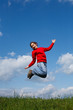 © Jacek Chabraszewski - Girl jumping, running against blue sky