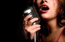 Beautiful Singer Singing With Microphone