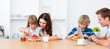 © WavebreakMediaMicro - Happy family eating breakfast in the kitchen