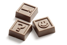 Question Mark, Exclamation Point And Smile Made Of Chocolate