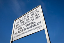 Sign At Checkpoint Charlie That Divided East And West Berlin