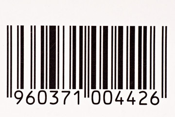 close up of black and white barcode with numbers