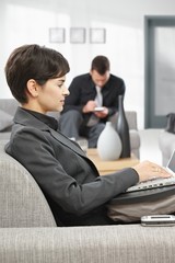 Canvas Print - Businesswoman working with laptop