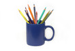 Nine pencils in the blue cup isolated on white