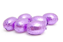 Purple Easter Eggs Over White Background