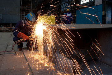 Wall Mural - welder cutting metal with blowtorch