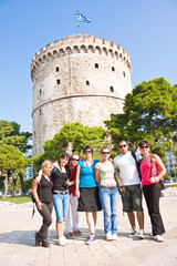 happy group tourist in greece
