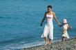 © snpolus - Woman with small girl go on seaside