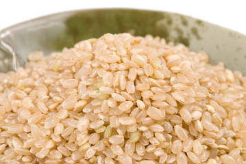 Isolated brown rice in bowl