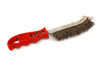 Brush for cleaning metal surfaces