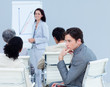 © WavebreakMediaMicro - Bored young businessman at a presentation