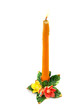 Burning candle in candlestick