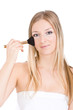 Causasian blonde makeup with brush