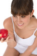 © CandyBox Images - Female teenager eat apple for breakfast
